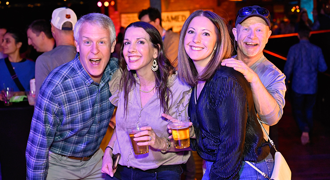 2025 IBS House Party two women, two men smiling