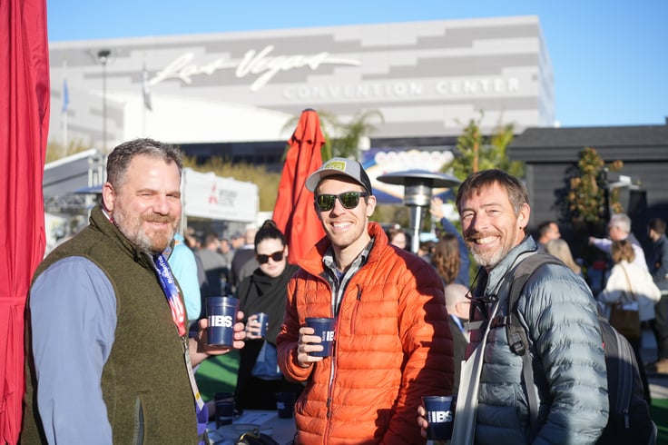 Three building professionals attend an official Show Village Happy Hour